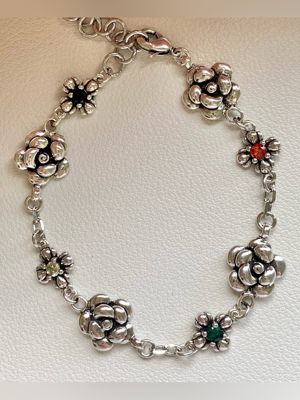 Silver Floral Link Bracelet with Multicolor Gem Accents